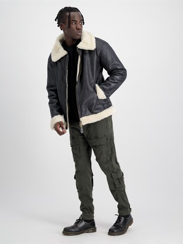 ALPHA INDUSTRIES Vinterjacka 'B3 FL' i svart