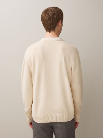 Next Neuletakki värissä beige