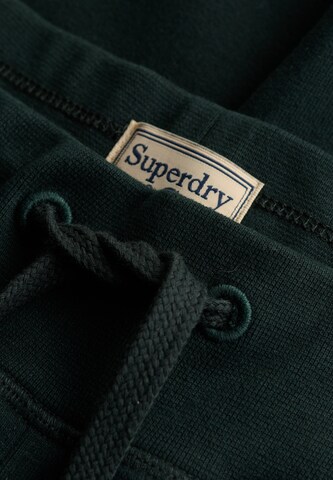 Superdry & Co Tapered Hose 'Essential' in Grün