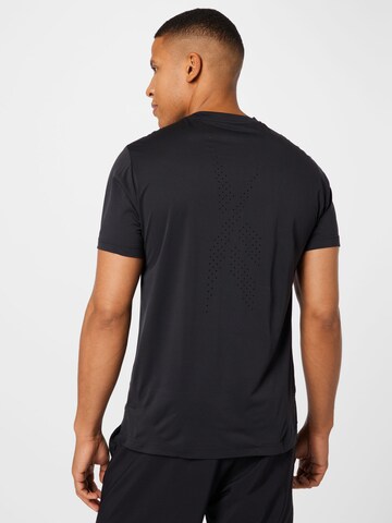 T-Shirt fonctionnel Reebok en noir