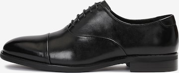 Kazar Lace-Up Shoes in Black: front