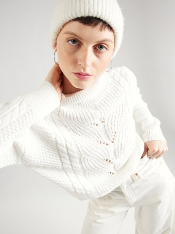 Pullover di comma casual identity in bianco