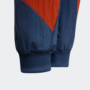 ADIDAS SPORTSWEAR Tapered Sports trousers 'Colorblock ' in Blue