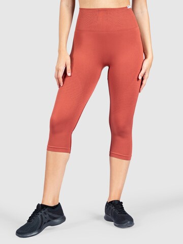 Smilodox Skinny Workout Pants 'Bloom' in Orange: front