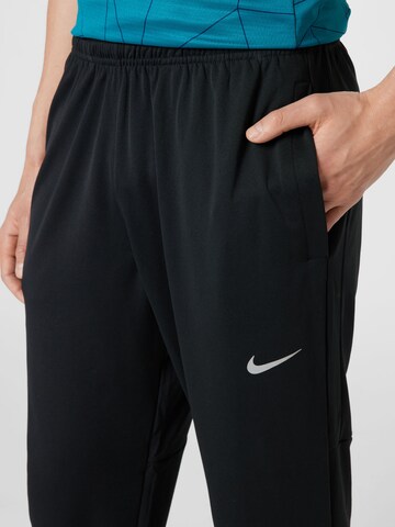 NIKE Tapered Sportsbukser i sort