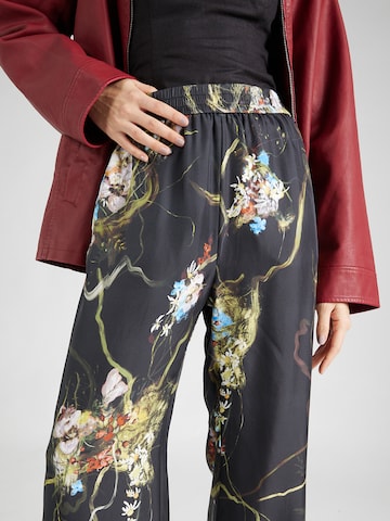 Wide leg Pantaloni 'ARUM' di Munthe in nero