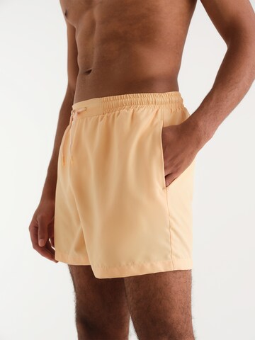 Shorts de bain 'Ibrahim' ABOUT YOU x Kevin Trapp en orange