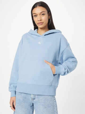 Sweat-shirt Calvin Klein Jeans en bleu : devant