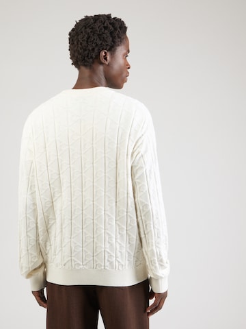 Pull-over Calvin Klein Jeans en blanc