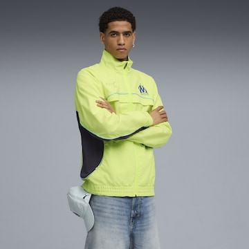 PUMA Sportjacke 'Olympique de Marseille FtblEssentials Cellerator' in Gelb: Vorderseite