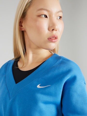 Nike Sportswear Bluzka sportowa 'Phoenix Fleece' w kolorze niebieski
