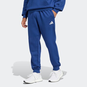Tapered Pantaloni sportivi 'FEELCOZY' di ADIDAS SPORTSWEAR in blu: frontale