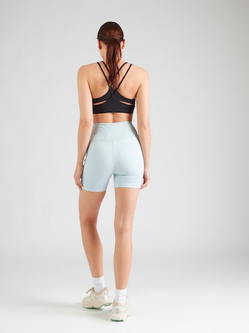 Reebok Skinny Sportnadrágok 'LUX PEACHED' - kék
