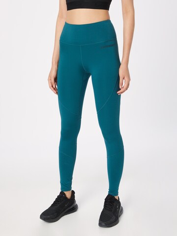 Skinny Pantalon de sport Superdry en bleu : devant