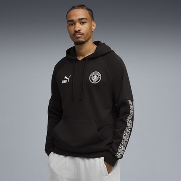 PUMA Sports sweatshirt 'Manchester City KING' in Black: front