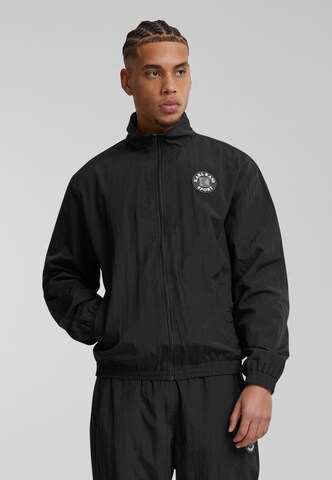 Giacca di mezza stagione 'Essential' di Karl Kani in nero