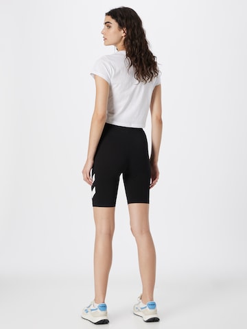 Hummel Skinny Sportshorts 'LEGACY' in Schwarz