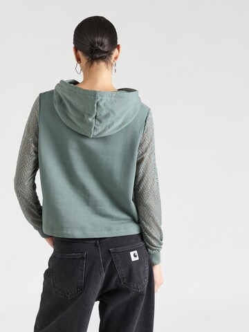 ABOUT YOU Sweatshirt in Grün