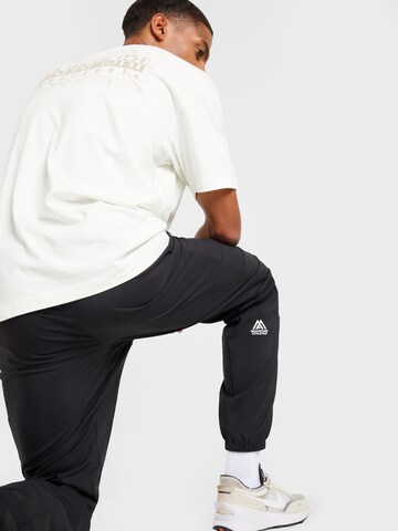 Effilé Pantalon de sport 'MOUNTAIN ATHLETICS' THE NORTH FACE en noir