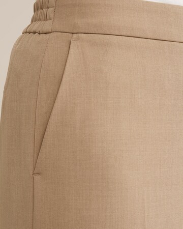 Wide leg Pantaloni con piega frontale di WE Fashion in beige