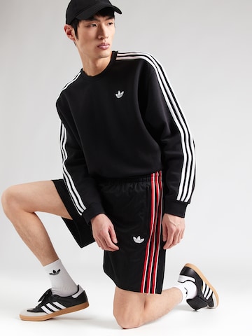 ADIDAS ORIGINALS Loosefit Byxa 'FIREBIRD' i svart