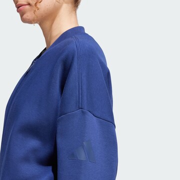 ADIDAS SPORTSWEAR Sports sweat jacket 'Essentials' in Blue