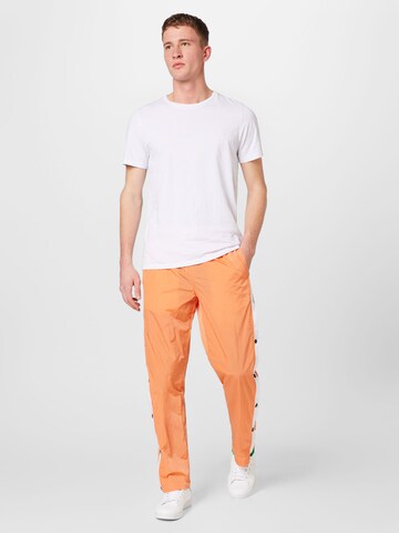 Tommy Jeans Loosefit Broek in Oranje