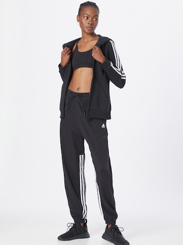 ADIDAS SPORTSWEAR Tapered Sportbroek 'Hyperglam 3-Stripes Cuffed With Side s' in Zwart