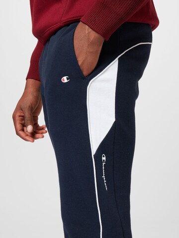 Champion Authentic Athletic Apparel Tapered Broek in Blauw