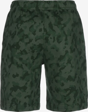 Regular Pantalon de sport Nike Sportswear en vert