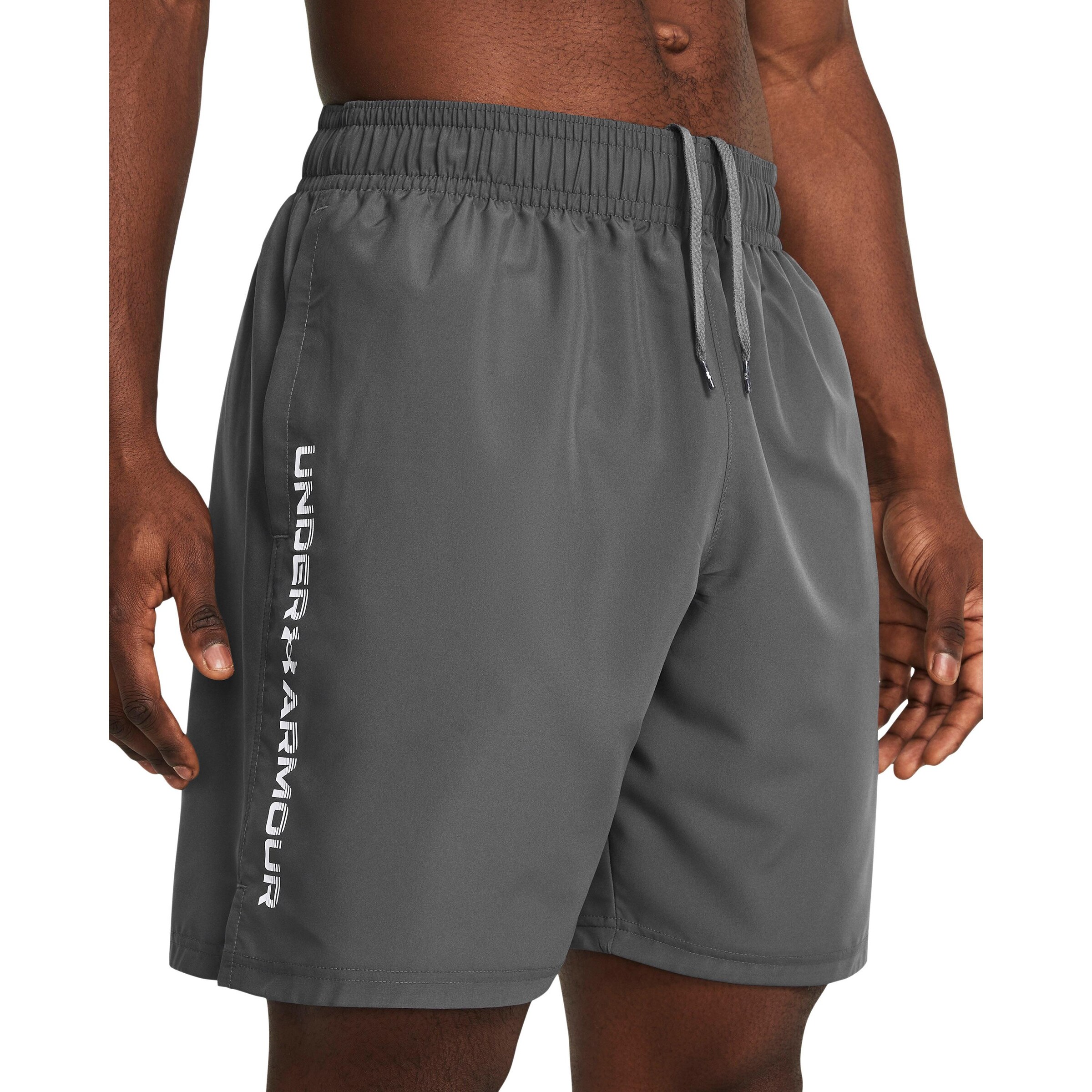UNDER ARMOUR - regular Pantalón deportivo 'Wordmark' en gris