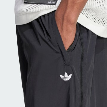 ADIDAS ORIGINALS Loose fit Trousers 'Adilenium Season 3' in Black