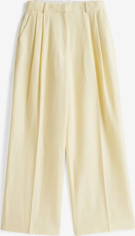 TOMMY HILFIGER Pleat-front trousers in Beige: front