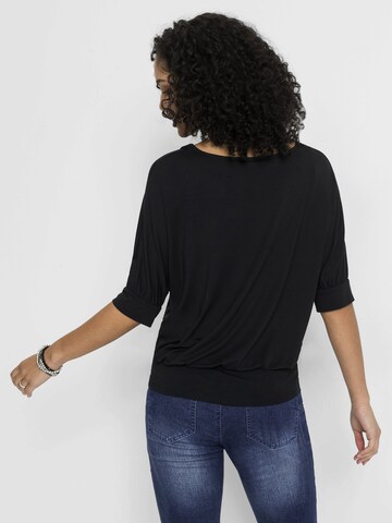 Tricou de la bonprix pe negru