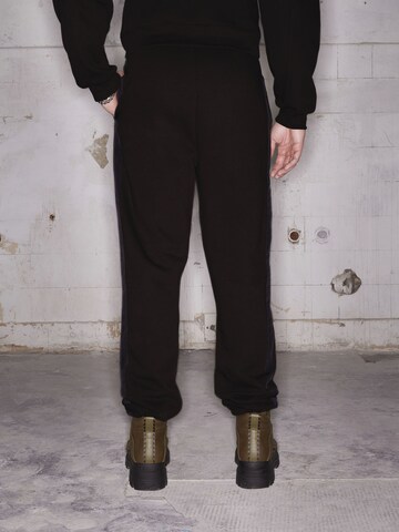 ABOUT YOU x Rewinside Tapered Pants 'Theo' in Black