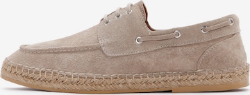 Derimod Instappers in Beige: voorkant