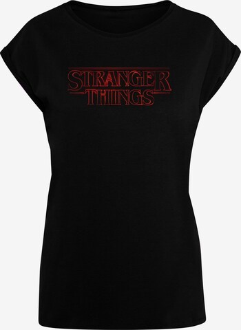 ABSOLUTE CULT Shirt 'Stranger Things - Glow' in Zwart: voorkant