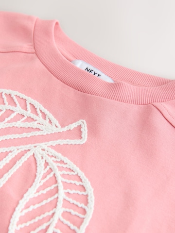 Tricou de la Next pe roz