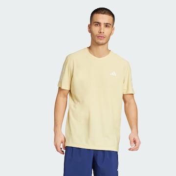 ADIDAS PERFORMANCE - Camiseta funcional 'Own The Run' en amarillo: frente