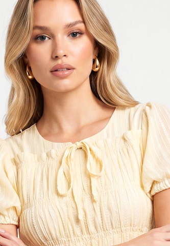 Robe faina en jaune