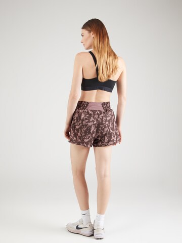 Loosefit Pantaloni sportivi 'ONE' di NIKE in lilla