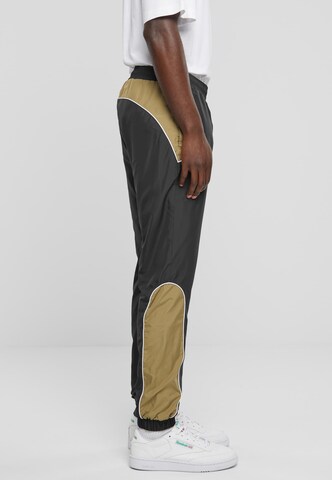 Urban Classics Tapered Sports trousers in Black