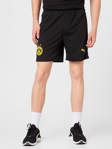 PUMA Regular Workout Pants 'Borussia Dortmund Home 2023/2024' in Black: front