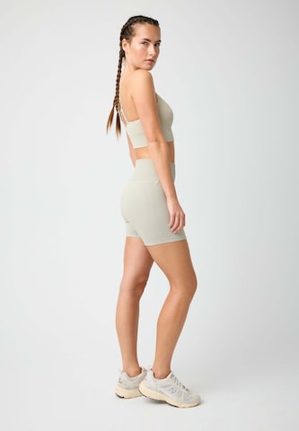 OCEANSAPART - Skinny Pantalón deportivo 'Maya' en gris