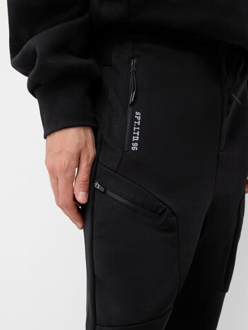Bershka Tapered Bukser i sort