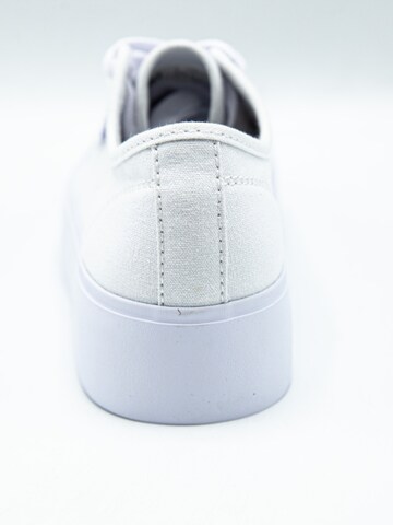 Baskets basses DC Shoes en blanc