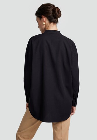 Usha - Blusa en negro