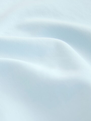 Tricou de la Next pe albastru