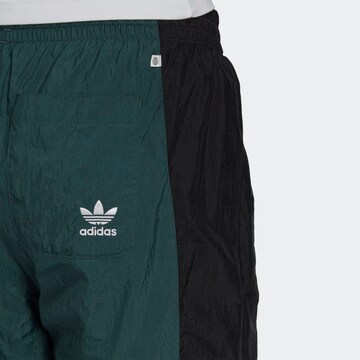 regular Pantaloni 'Rekive' di ADIDAS ORIGINALS in verde