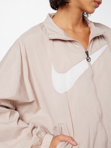 Nike Sportswear Välikausitakki värissä beige